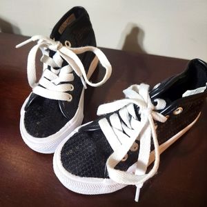 Sequined black high-top sneakers